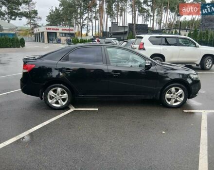 Черный Киа Черато, объемом двигателя 1.6 л и пробегом 253 тыс. км за 5300 $, фото 6 на Automoto.ua