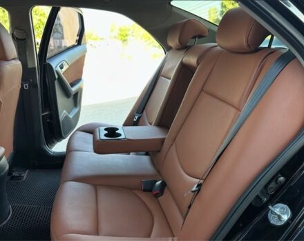 Чорний Кіа Черато, об'ємом двигуна 2 л та пробігом 170 тис. км за 5700 $, фото 3 на Automoto.ua
