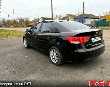 Черный Киа Черато, объемом двигателя 1.6 л и пробегом 200 тыс. км за 5650 $, фото 5 на Automoto.ua