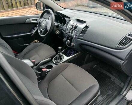 Черный Киа Черато, объемом двигателя 1.59 л и пробегом 253 тыс. км за 5300 $, фото 24 на Automoto.ua