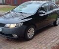 Чорний Кіа Черато, об'ємом двигуна 1.59 л та пробігом 205 тис. км за 5800 $, фото 1 на Automoto.ua