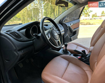 Черный Киа Черато, объемом двигателя 2 л и пробегом 170 тыс. км за 6199 $, фото 12 на Automoto.ua