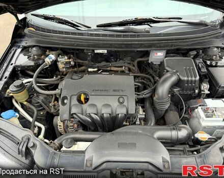 Черный Киа Черато, объемом двигателя 1.6 л и пробегом 200 тыс. км за 5650 $, фото 10 на Automoto.ua