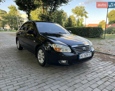 Чорний Кіа Черато, об'ємом двигуна 1.98 л та пробігом 265 тис. км за 5900 $, фото 1 на Automoto.ua