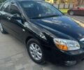 Черный Киа Черато, объемом двигателя 1.59 л и пробегом 123 тыс. км за 5200 $, фото 1 на Automoto.ua
