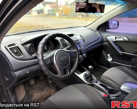 Черный Киа Черато, объемом двигателя 1.6 л и пробегом 200 тыс. км за 5650 $, фото 6 на Automoto.ua