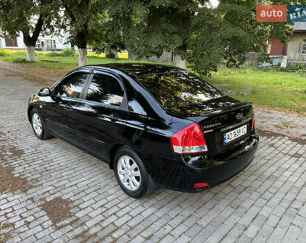 Чорний Кіа Черато, об'ємом двигуна 1.98 л та пробігом 265 тис. км за 5900 $, фото 20 на Automoto.ua