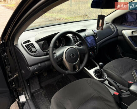 Черный Киа Черато, объемом двигателя 1.59 л и пробегом 183 тыс. км за 6800 $, фото 6 на Automoto.ua