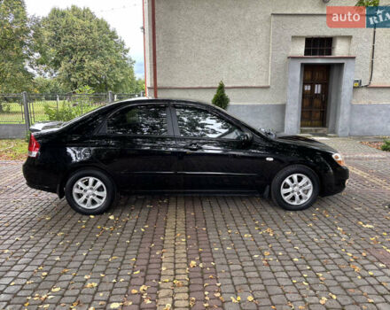 Черный Киа Черато, объемом двигателя 1.98 л и пробегом 265 тыс. км за 5450 $, фото 6 на Automoto.ua