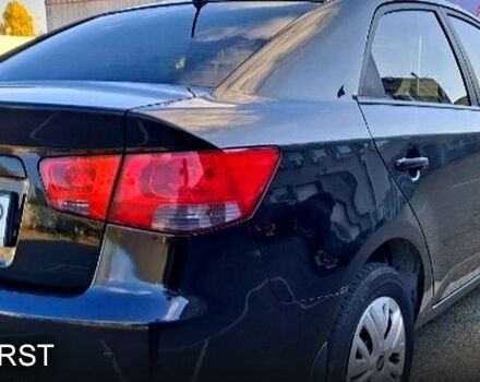 Черный Киа Черато, объемом двигателя 1.6 л и пробегом 300 тыс. км за 4999 $, фото 2 на Automoto.ua