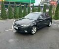 Черный Киа Черато, объемом двигателя 1.6 л и пробегом 253 тыс. км за 5300 $, фото 1 на Automoto.ua