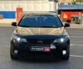 Чорний Кіа Черато, об'ємом двигуна 1.6 л та пробігом 173 тис. км за 6940 $, фото 1 на Automoto.ua
