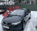 Черный Киа Черато, объемом двигателя 1.59 л и пробегом 233 тыс. км за 6000 $, фото 1 на Automoto.ua