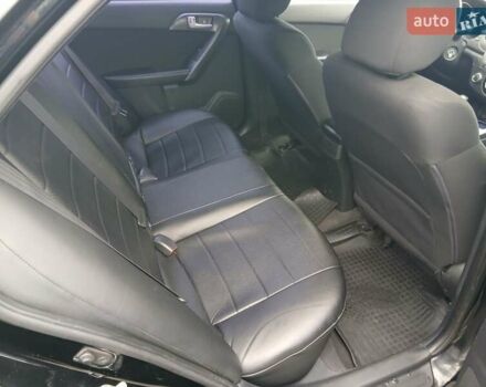 Черный Киа Черато, объемом двигателя 1.6 л и пробегом 253 тыс. км за 5300 $, фото 20 на Automoto.ua