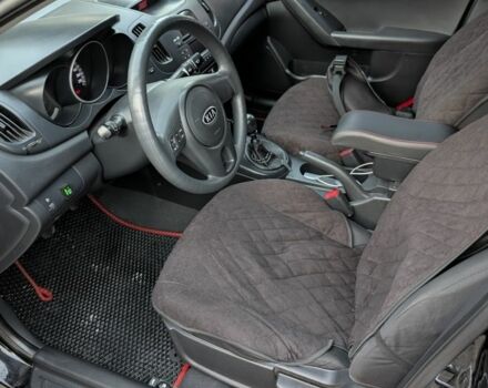 Чорний Кіа Черато, об'ємом двигуна 1.6 л та пробігом 179 тис. км за 6800 $, фото 5 на Automoto.ua