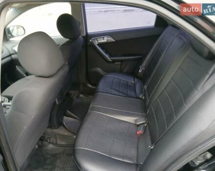 Черный Киа Черато, объемом двигателя 1.59 л и пробегом 253 тыс. км за 5300 $, фото 19 на Automoto.ua