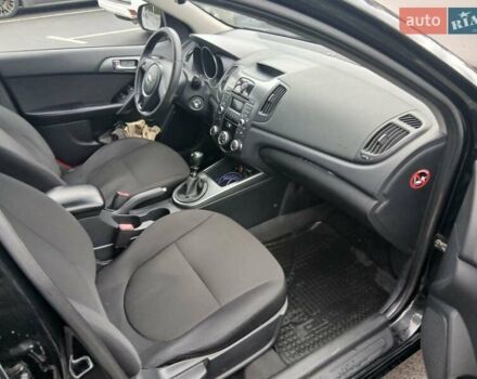 Черный Киа Черато, объемом двигателя 1.6 л и пробегом 253 тыс. км за 5300 $, фото 17 на Automoto.ua