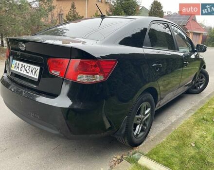 Чорний Кіа Черато, об'ємом двигуна 1.59 л та пробігом 203 тис. км за 6100 $, фото 5 на Automoto.ua