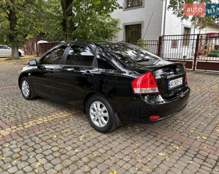 Черный Киа Черато, объемом двигателя 1.98 л и пробегом 264 тыс. км за 5800 $, фото 5 на Automoto.ua