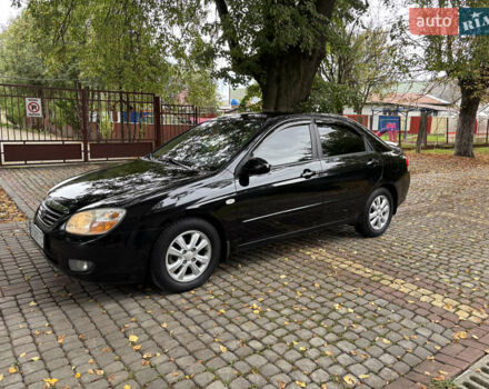 Черный Киа Черато, объемом двигателя 1.98 л и пробегом 265 тыс. км за 5450 $, фото 1 на Automoto.ua