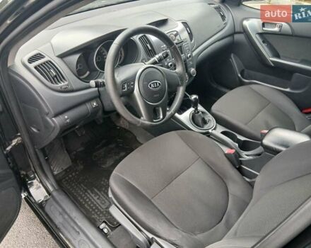 Черный Киа Черато, объемом двигателя 1.6 л и пробегом 253 тыс. км за 5300 $, фото 14 на Automoto.ua