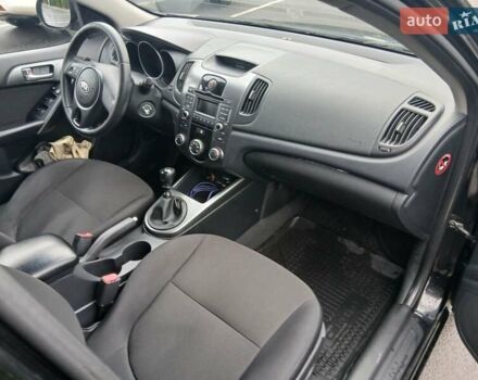 Черный Киа Черато, объемом двигателя 1.6 л и пробегом 253 тыс. км за 5300 $, фото 18 на Automoto.ua