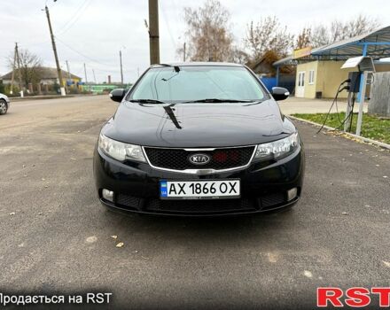Черный Киа Черато, объемом двигателя 1.6 л и пробегом 200 тыс. км за 5650 $, фото 1 на Automoto.ua