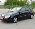 Чорний Кіа Черато, об'ємом двигуна 1.6 л та пробігом 78 тис. км за 7500 $, фото 1 на Automoto.ua