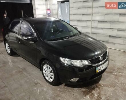 Черный Киа Черато, объемом двигателя 1.59 л и пробегом 180 тыс. км за 6800 $, фото 1 на Automoto.ua