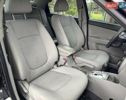 Черный Киа Черато, объемом двигателя 1.98 л и пробегом 265 тыс. км за 5450 $, фото 11 на Automoto.ua