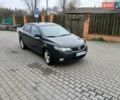 Черный Киа Черато, объемом двигателя 1.59 л и пробегом 253 тыс. км за 5300 $, фото 3 на Automoto.ua