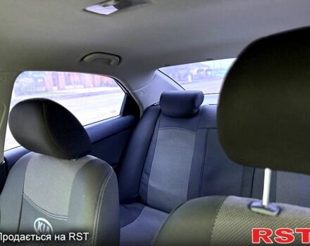 Черный Киа Черато, объемом двигателя 1.6 л и пробегом 200 тыс. км за 5650 $, фото 8 на Automoto.ua