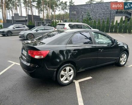 Черный Киа Черато, объемом двигателя 1.6 л и пробегом 253 тыс. км за 5300 $, фото 1 на Automoto.ua