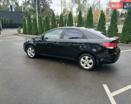 Черный Киа Черато, объемом двигателя 1.6 л и пробегом 253 тыс. км за 5300 $, фото 2 на Automoto.ua