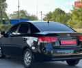 Киа Черато 2009 в Днепре (Днепропетровске) на Automoto.ua Черный Киа Черато, объемом двигателя 2 л и пробегом 162 тыс. км за 5700 $, фото 5 на Automoto.ua