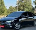 Чорний Кіа Черато, об'ємом двигуна 2 л та пробігом 170 тис. км за 5700 $, фото 1 на Automoto.ua