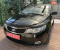 Черный Киа Черато, объемом двигателя 1.6 л и пробегом 153 тыс. км за 8700 $, фото 1 на Automoto.ua