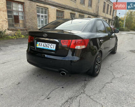 Черный Киа Черато, объемом двигателя 1.98 л и пробегом 166 тыс. км за 7500 $, фото 6 на Automoto.ua