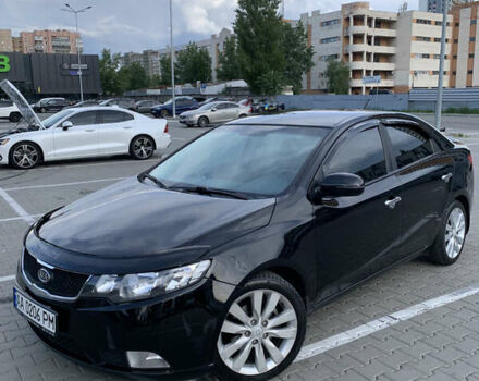 Черный Киа Черато, объемом двигателя 2 л и пробегом 175 тыс. км за 9400 $, фото 2 на Automoto.ua