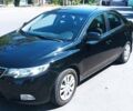 Черный Киа Черато, объемом двигателя 1.59 л и пробегом 183 тыс. км за 6200 $, фото 1 на Automoto.ua