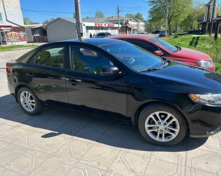 Черный Киа Черато, объемом двигателя 2 л и пробегом 203 тыс. км за 9000 $, фото 1 на Automoto.ua