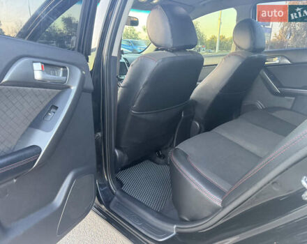 Черный Киа Черато, объемом двигателя 2 л и пробегом 183 тыс. км за 8299 $, фото 11 на Automoto.ua