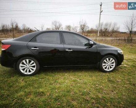 Черный Киа Черато, объемом двигателя 2 л и пробегом 96 тыс. км за 8500 $, фото 5 на Automoto.ua