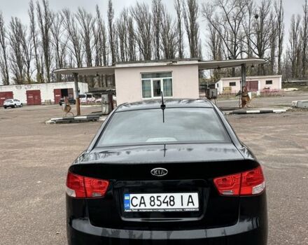 Черный Киа Черато, объемом двигателя 2 л и пробегом 300 тыс. км за 5499 $, фото 4 на Automoto.ua