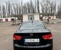 Черный Киа Черато, объемом двигателя 2 л и пробегом 300 тыс. км за 5499 $, фото 4 на Automoto.ua