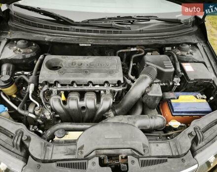 Черный Киа Черато, объемом двигателя 2 л и пробегом 96 тыс. км за 8500 $, фото 14 на Automoto.ua