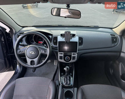 Черный Киа Черато, объемом двигателя 2 л и пробегом 183 тыс. км за 8299 $, фото 12 на Automoto.ua
