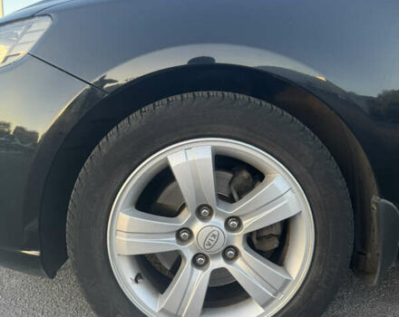 Черный Киа Черато, объемом двигателя 2 л и пробегом 183 тыс. км за 8299 $, фото 1 на Automoto.ua