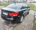 Черный Киа Черато, объемом двигателя 2 л и пробегом 227 тыс. км за 6300 $, фото 3 на Automoto.ua