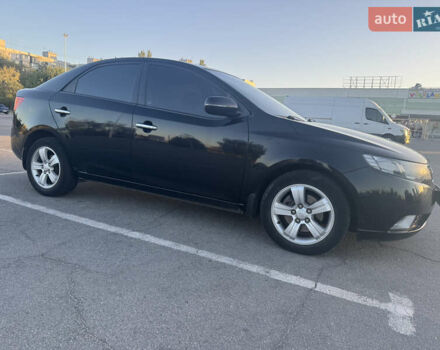 Черный Киа Черато, объемом двигателя 2 л и пробегом 183 тыс. км за 8299 $, фото 2 на Automoto.ua